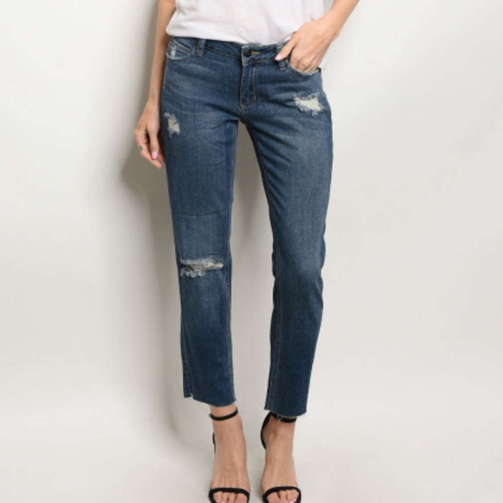 Cropped destroyed medium wash denim jeans